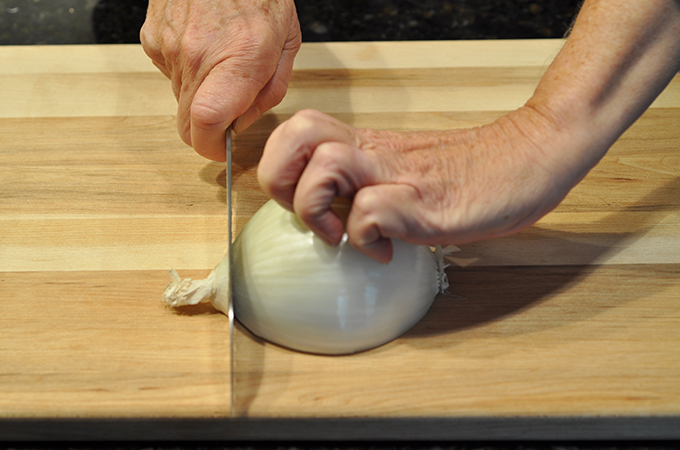 Cutting an inion with a claw grip