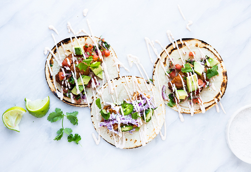 Open-faced fish and shrimp tacos