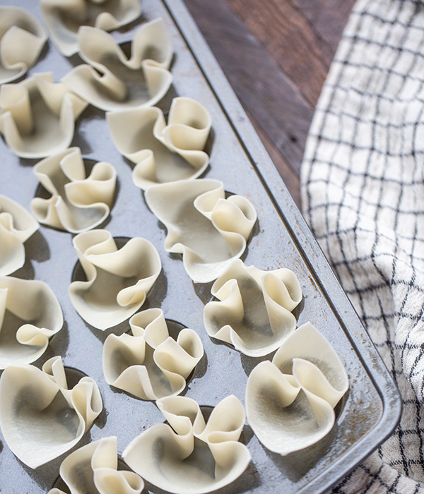 Crab wonton wrappers in muffin tin