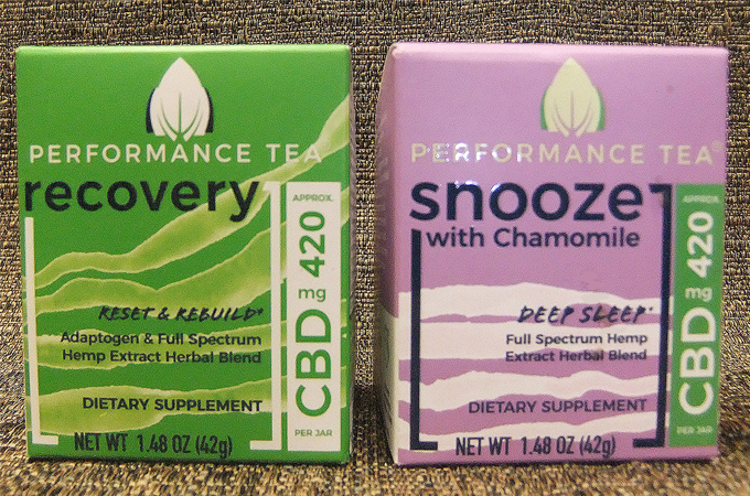 Two boxes of Performance Tea with CBD, one recovery and the other snooze with chamomile.