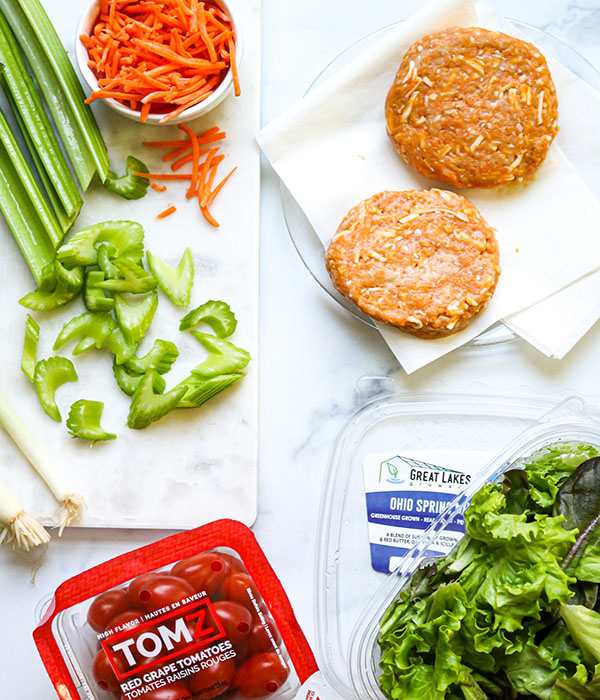 Buffalo Chicken Burger Bowl Ingredients on a Marble Counter