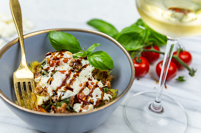 Italian Caprese Stuffed Spaghetti Squash In a Bowl