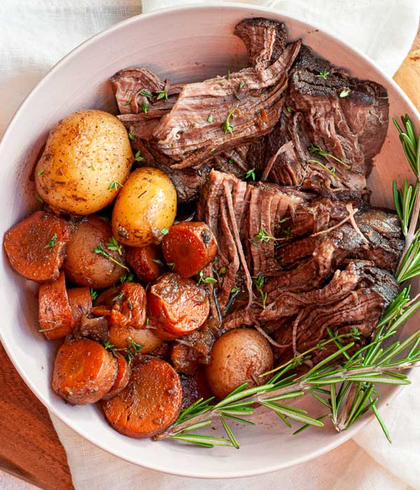 Dutch Oven Pot Roast with Carrots and Potatoes