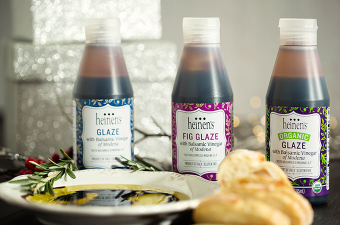 Bottles of Heinen's balsamic glaze, fig glaze and organic balsamic glaze.