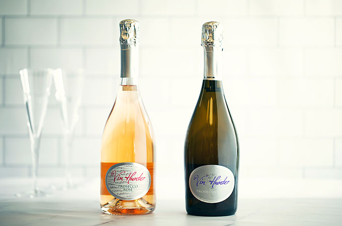 Bottle of Vin Hunter Prosecco Rose next to a bottle of Vin Hunter Prosecco.