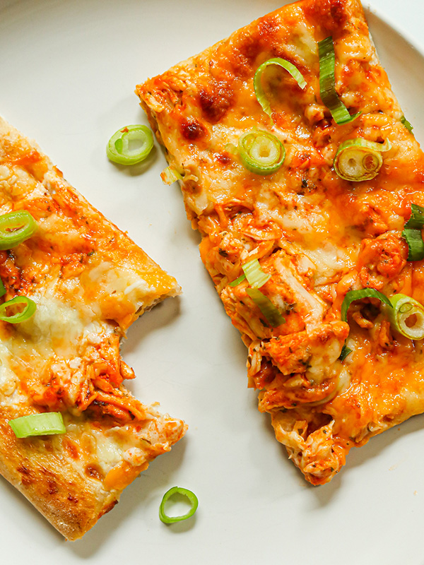 Buffalo Chicken Sheet Pan Pizza slices. 