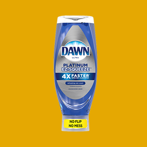 Dawn platinum ex-squeeze dish soap container on an orange background.