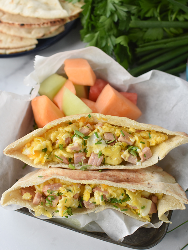 Egg and bacon pitas served with fresh melon.