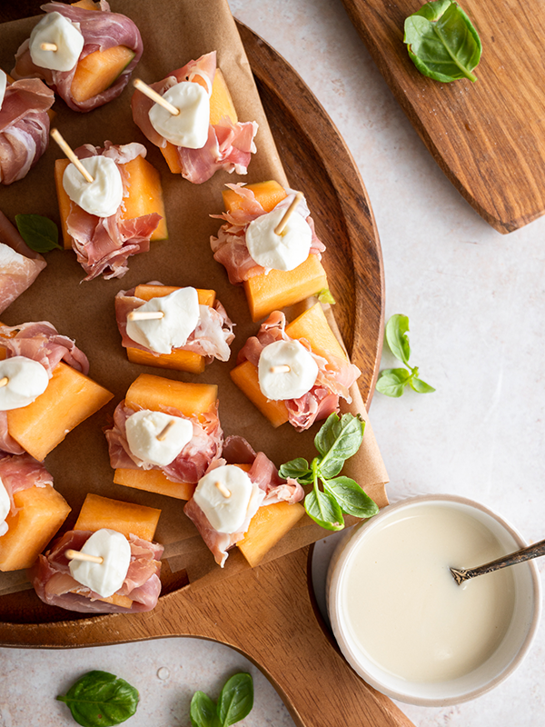 Prosciutto Melon Bites with Goat Cheese and Honey Drizzle