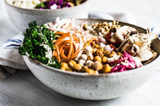 Veggie Buddha Bowl in a Bowl with a White Napkin