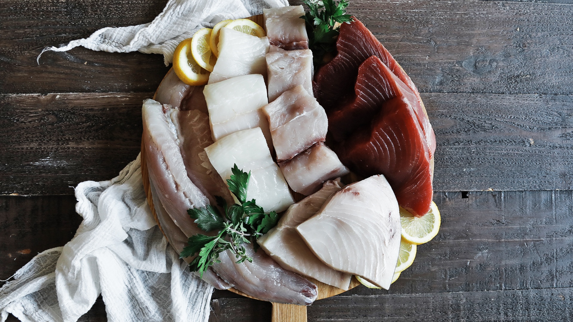 A Plate of Fresh Fish on a Wood Surface.
