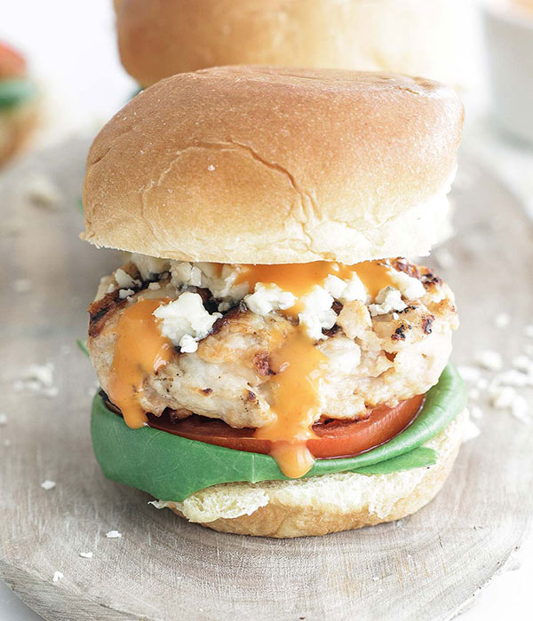 Buffalo Chicken Slider on a Toasted Bun with Tomato and Lettuce