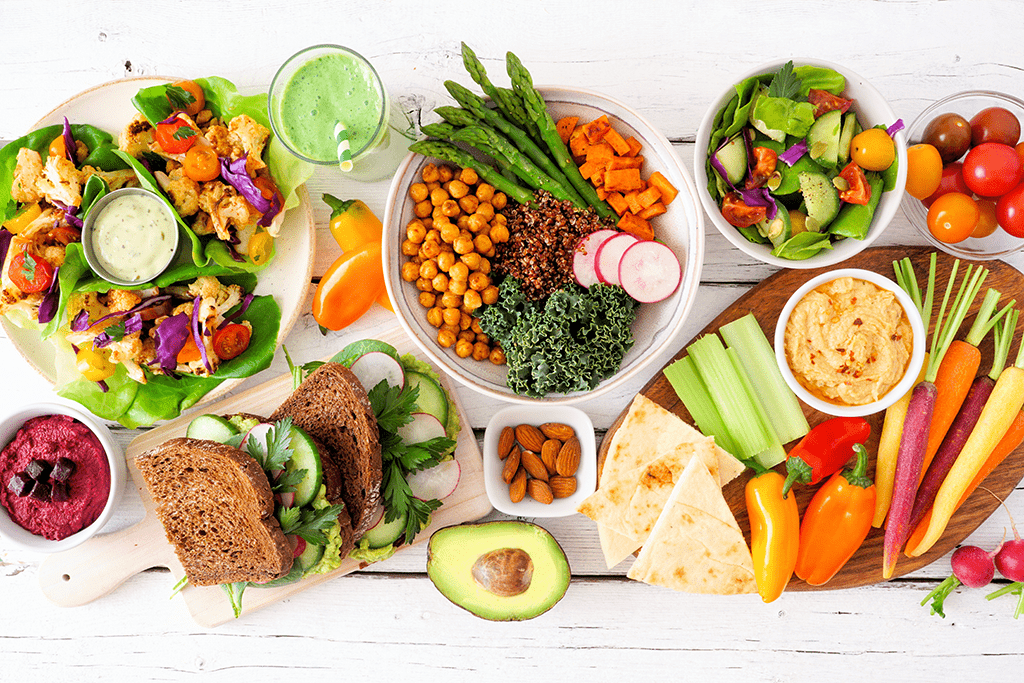A Bird's Eye Image of Healthy, Plant-Based, and Colorful Meals and Snacks