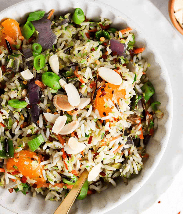 Wild Rice Pilaf in a White Bowl with a Spoon