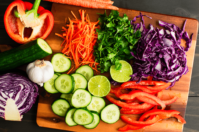 Colorful vegetables on a cutting board.