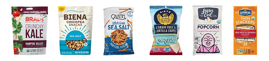 Gluten Free snacks including Brad's kale chips, Biena chickpea snacks, Quinn pretzels, Siete tortilla chips, Lesser Evil popcorn, and Lundberg thin stackers.