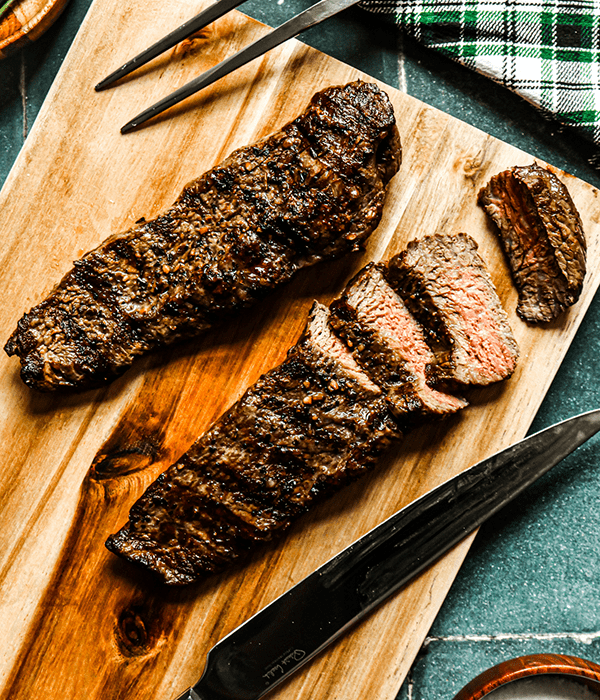 Tw Heinen's Premium Grilled Coulotte Steaks on a Cutting Board