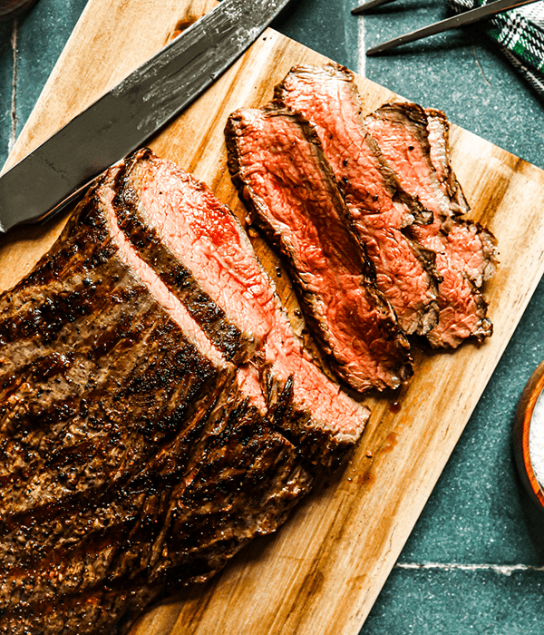 Heinen's Grilled Premium Flank Steak on a Cutting Board