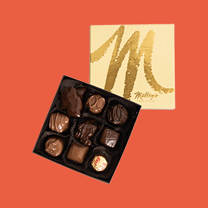 Gold box of nine assorted Malley's Chocolates.