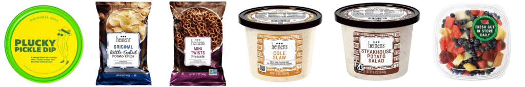 Heinen's Snacks and Sides Including Plucky Pickle Dip, Heinen's Original Kettle Chips, Heinen's Mini Pretzel Twists, Heinen's Macaroni Salad, Heinen's Potato Salad, and Heinen's Fresh Cut Fruit