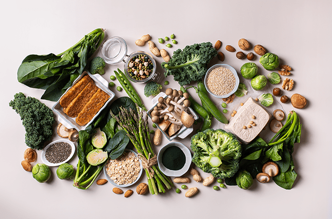 A Top-Down Image of Green Vegetables and Legumes