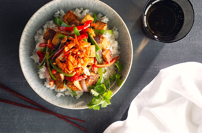Korean Tofu Fried Rice on a place with chopsticks