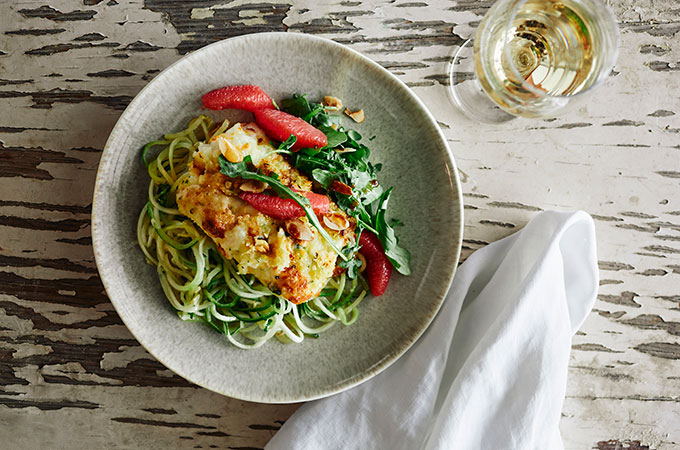 Plate of citrus cod with zucchini noodles
