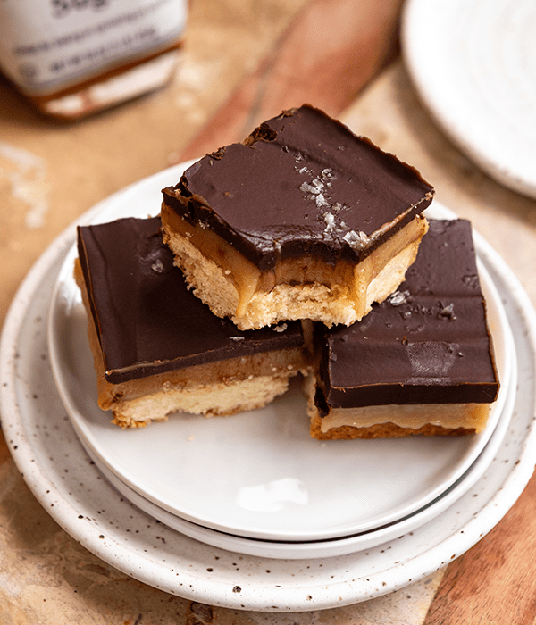 Three Millionaire's Shortbread Squares on a Plate